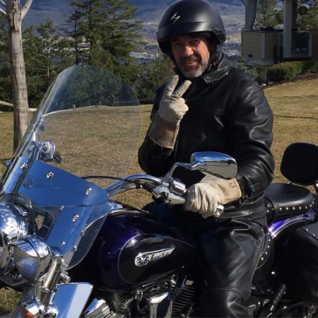 Shaun Johnston posing with his bike.